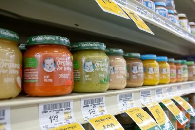 A store aisle of baby food