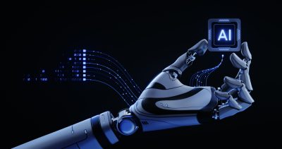 A robotic arm holds an AI processor