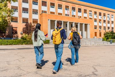 Three students walk to school