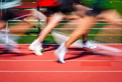 Athletes running on a track